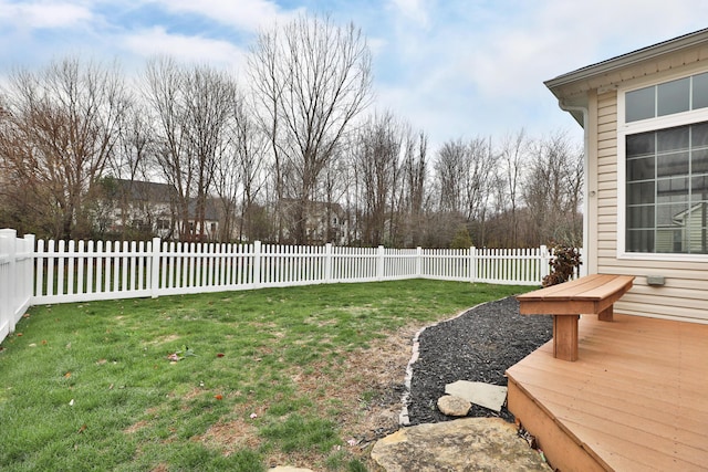 view of yard with a wooden deck