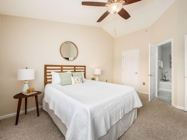 carpeted bedroom featuring ceiling fan and vaulted ceiling