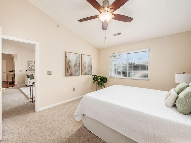 carpeted bedroom featuring ceiling fan and lofted ceiling