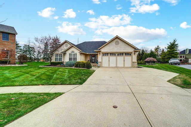 ranch-style house featuring a front lawn and a garage