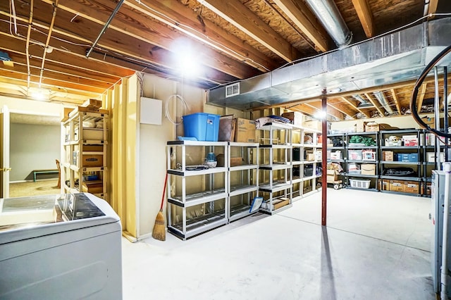 storage area featuring washer / dryer