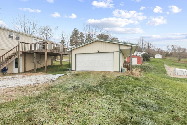 garage with a lawn