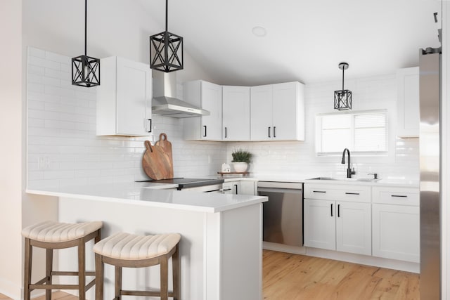 kitchen featuring white cabinetry, sink, and stainless steel appliances