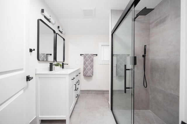 bathroom with vanity and walk in shower