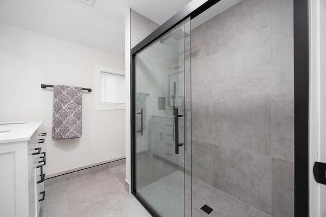 bathroom with vanity and walk in shower