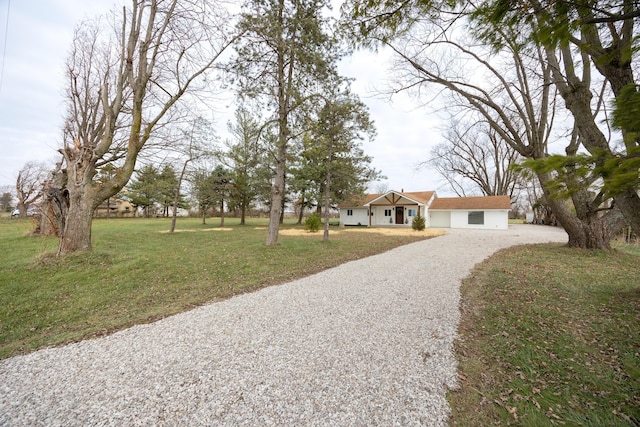 ranch-style house with a front yard