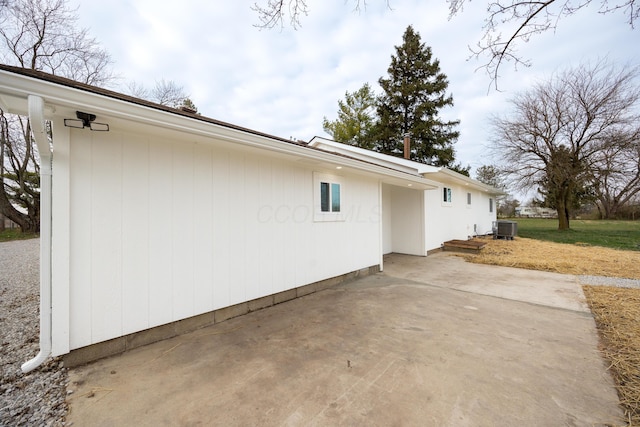 view of home's exterior featuring a patio area and central air condition unit