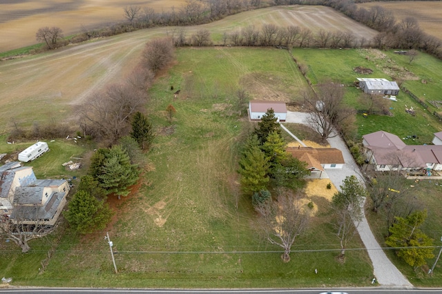 birds eye view of property featuring a rural view