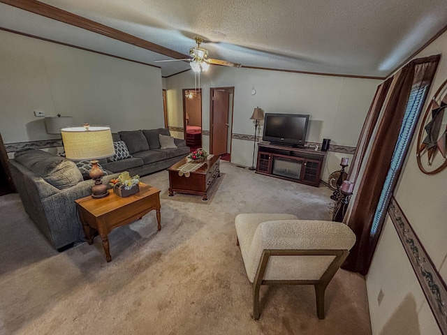 carpeted living room with a fireplace, ceiling fan, and a textured ceiling