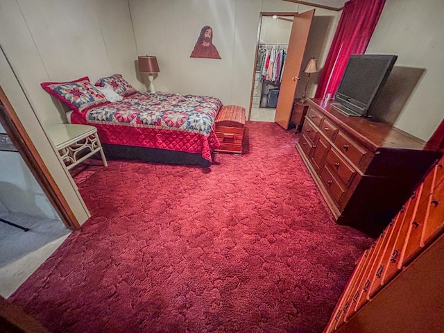 bedroom with a closet and carpet floors