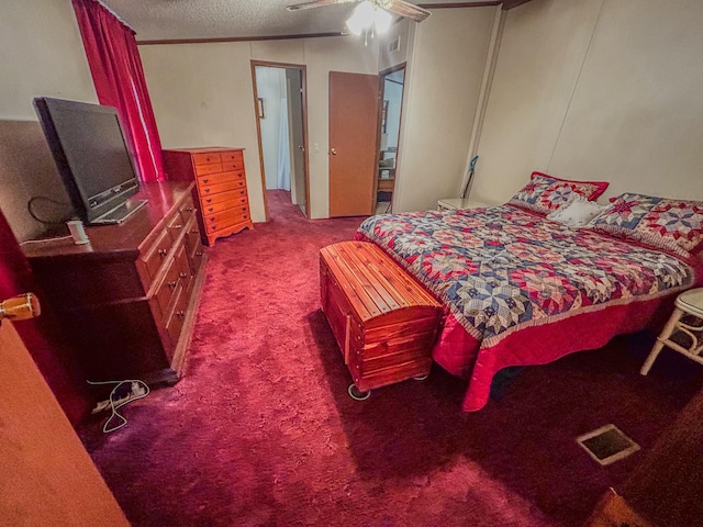 carpeted bedroom with a textured ceiling, ceiling fan, and lofted ceiling