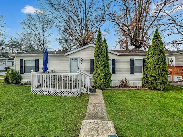 7140 Selby Rd Lot 44, Athens, OH 45701 - manufactured / mobile home featuring a front lawn and a wooden deck