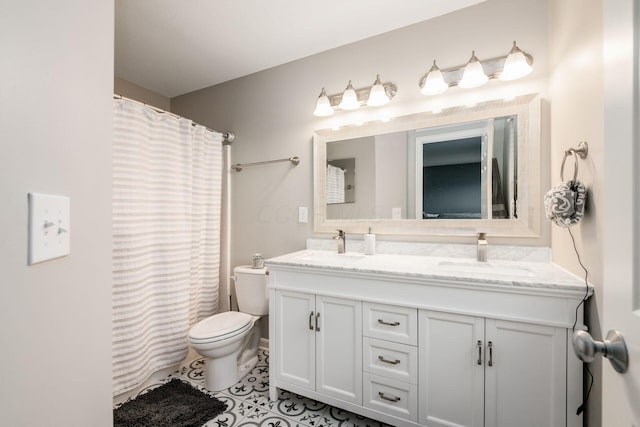 bathroom featuring a shower with curtain, vanity, toilet, and tile patterned floors