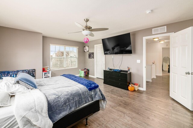 bedroom featuring ceiling fan and wood-type flooring