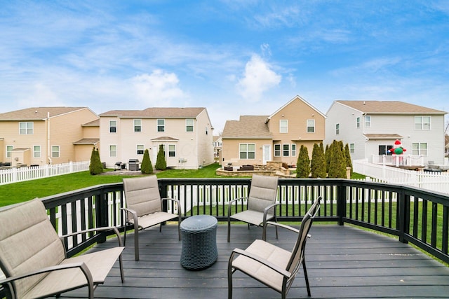 deck featuring a yard