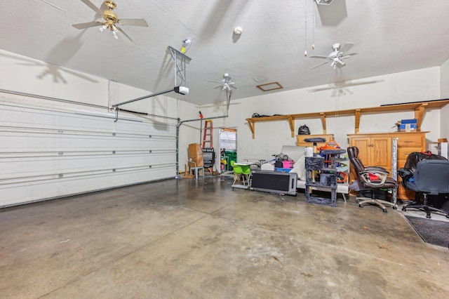 garage with ceiling fan and a garage door opener