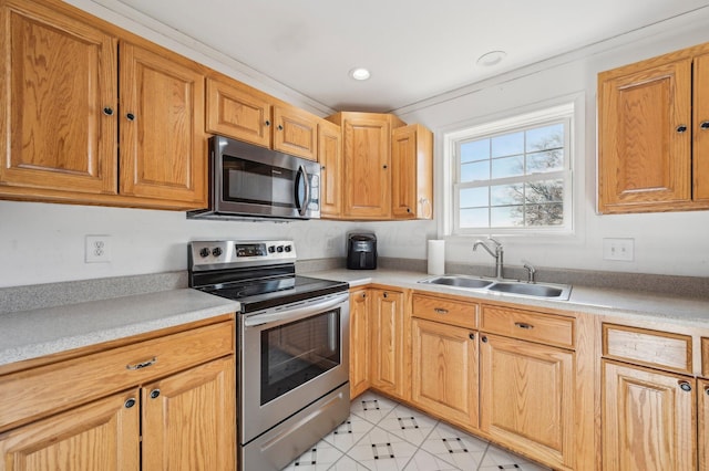 kitchen with appliances with stainless steel finishes and sink