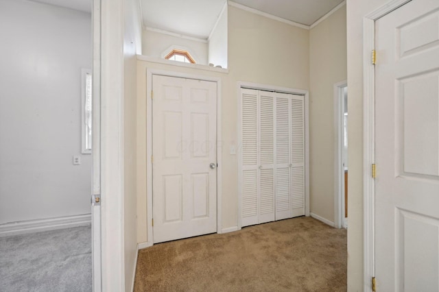 entryway featuring light colored carpet