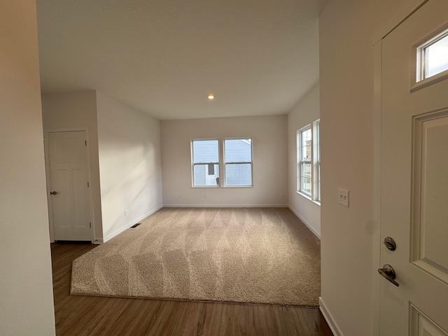 spare room featuring carpet floors