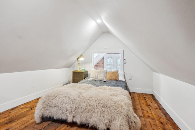 1030 Jaeger St, Columbus, OH 43206 - bedroom featuring vaulted ceiling and hardwood / wood-style flooring