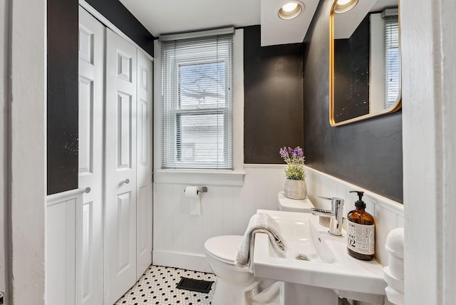 1030 Jaeger St, Columbus, OH 43206 - bathroom with wainscoting and a closet