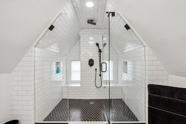 1030 Jaeger St, Columbus, OH 43206 - full bathroom featuring a shower stall and vaulted ceiling