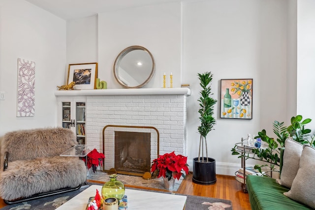 1030 Jaeger St, Columbus, OH 43206 - living room with wood finished floors and a fireplace
