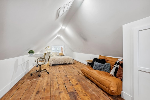 1030 Jaeger St, Columbus, OH 43206 - bedroom featuring vaulted ceiling and hardwood / wood-style floors
