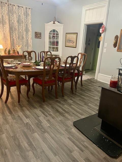 dining room with hardwood / wood-style floors