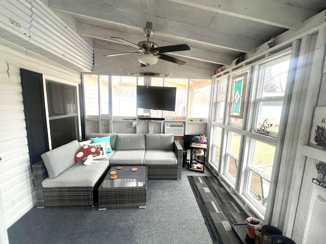 sunroom / solarium with ceiling fan