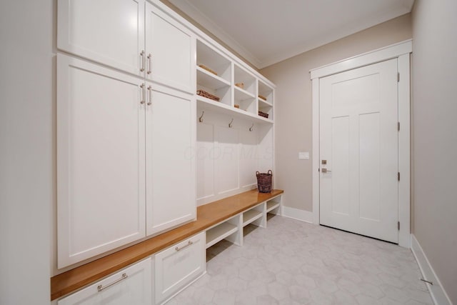 mudroom with light tile patterned floors