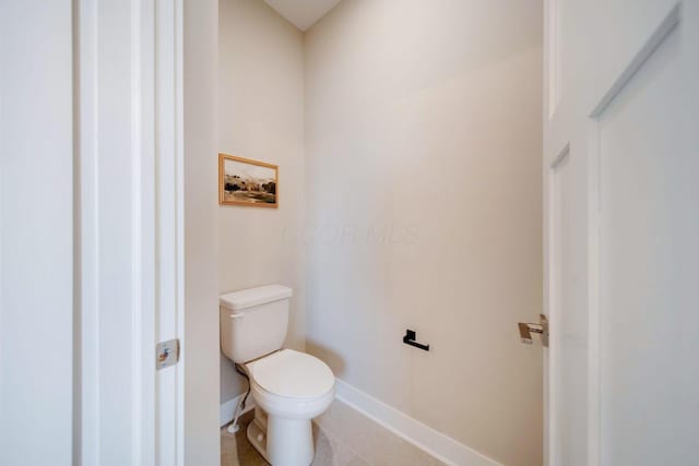 bathroom featuring toilet