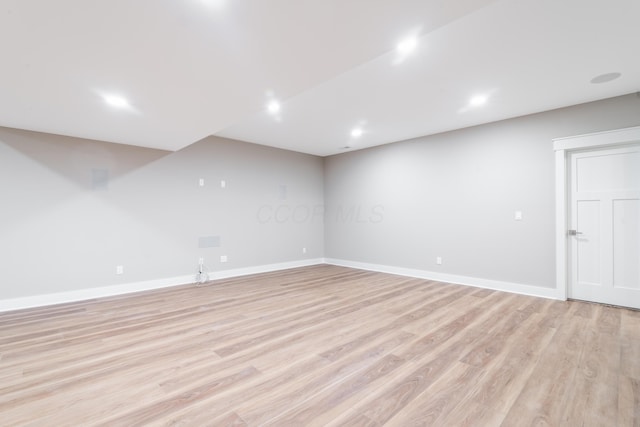 basement featuring light hardwood / wood-style flooring