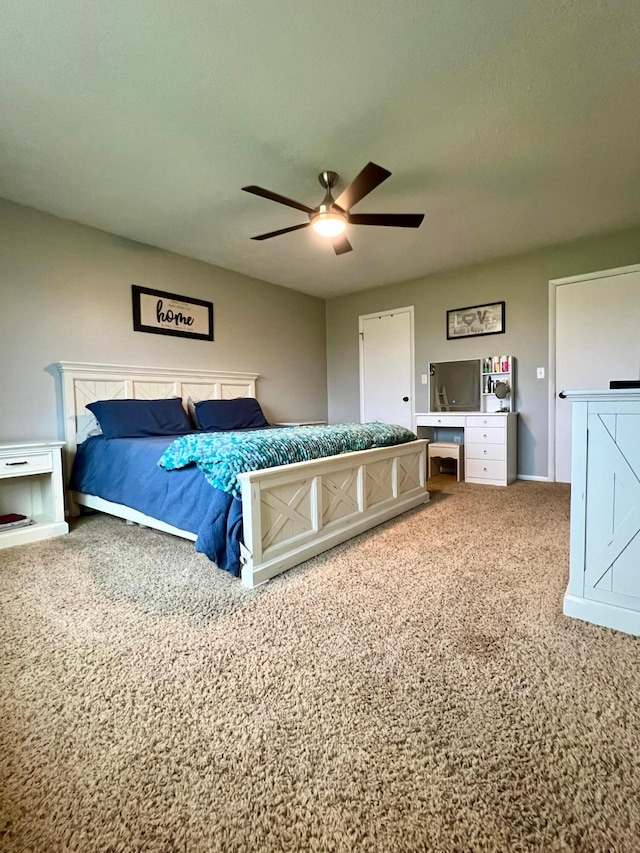 bedroom with carpet flooring and ceiling fan