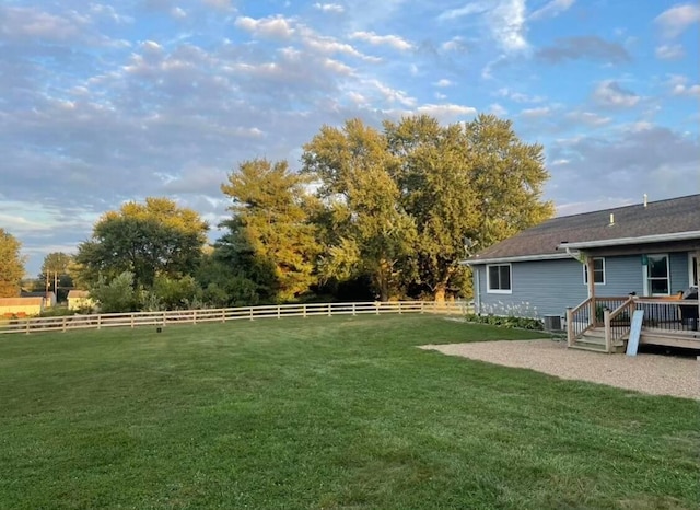 view of yard featuring a wooden deck