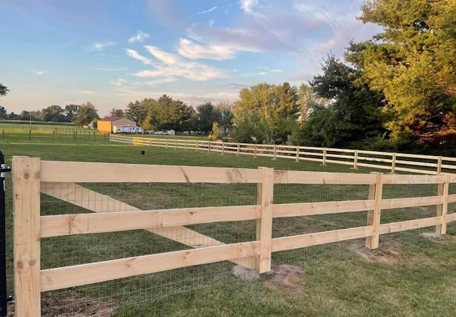 view of gate featuring a rural view