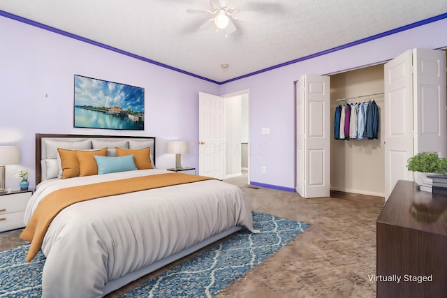 bedroom with carpet flooring, ceiling fan, ornamental molding, a textured ceiling, and a closet