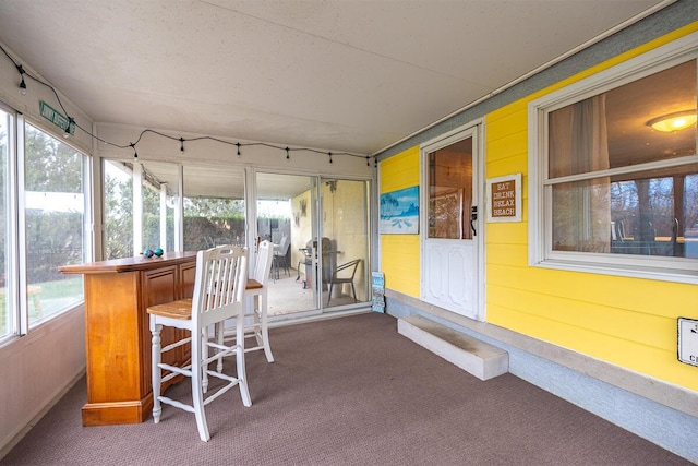 sunroom / solarium with a healthy amount of sunlight