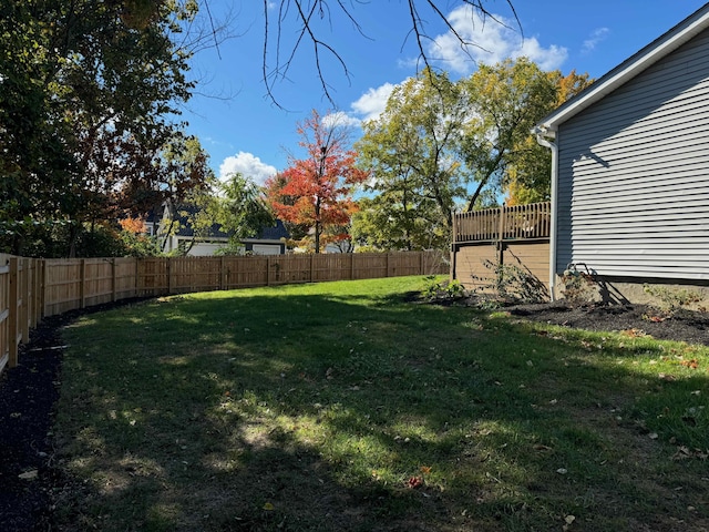 view of yard with a deck