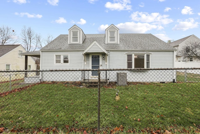 cape cod home with a front yard