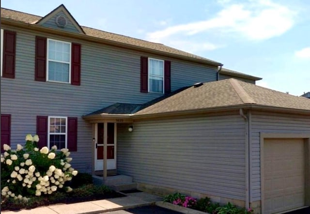 front of property featuring a garage