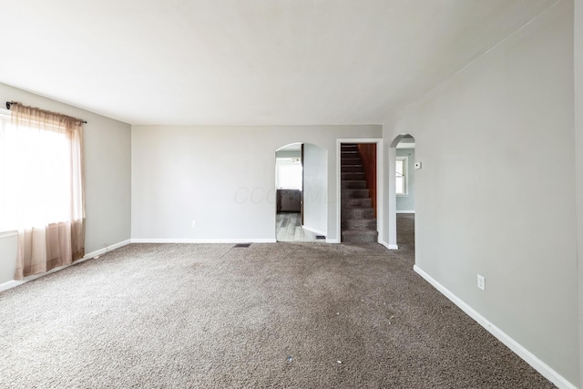 empty room with carpet flooring