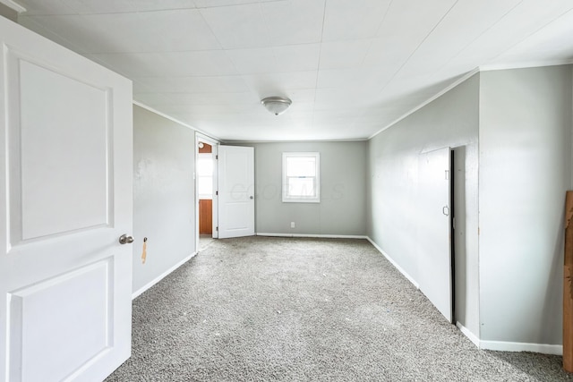 spare room featuring carpet floors