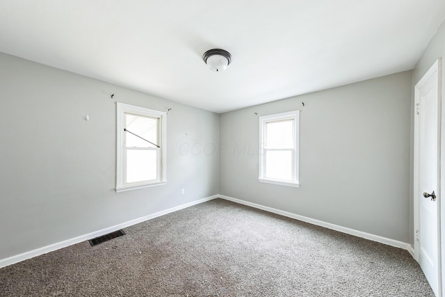 empty room featuring carpet