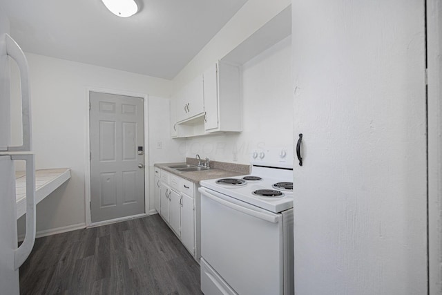 kitchen featuring white cabinets, dark hardwood / wood-style flooring, white appliances, and sink