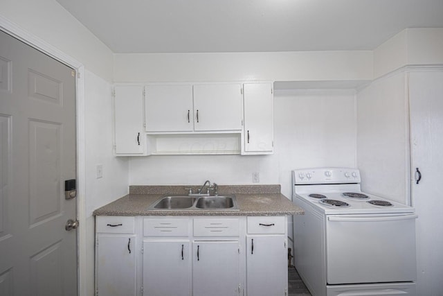 kitchen with sink, white cabinetry, and white electric stove