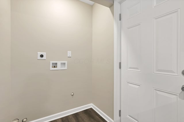 clothes washing area featuring electric dryer hookup, hookup for a gas dryer, dark wood-type flooring, and washer hookup