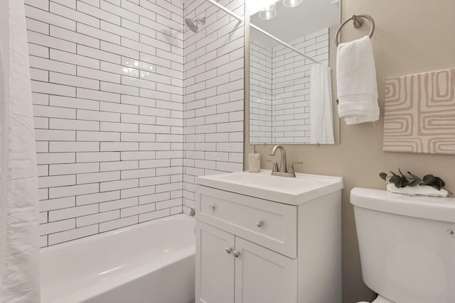 full bathroom featuring shower / bath combo with shower curtain, vanity, and toilet