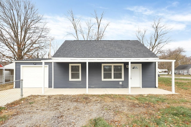 view of front facade with a porch and a garage