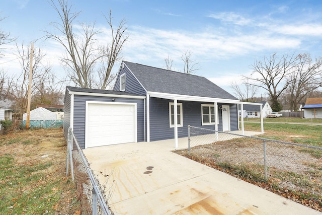 view of front of property with a garage and covered porch